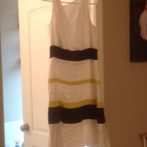 White, blue, and yellow sleeveless dress.